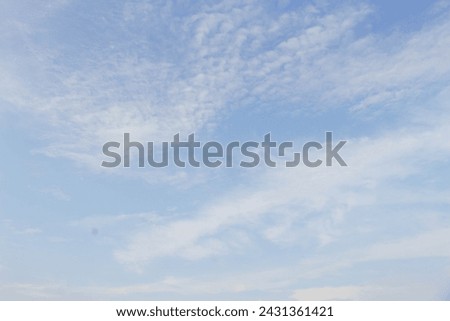 Blue sky with gradations of clouds in the background