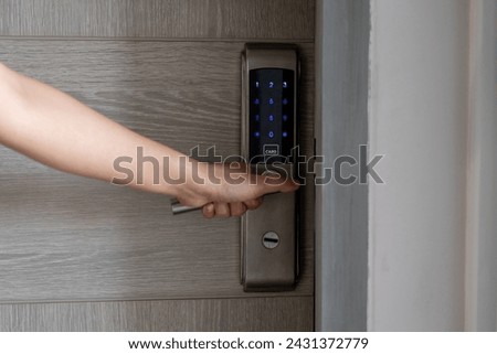 Electronic card key for open door in hotel. Smart card key to lock and unlock door. Security systems and protection concept.