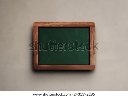 Chalkboard mockup isolated on wall background