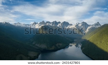 Journey Along the Pacific and Aerial Panorama of the Scenic Sea to Sky Highway at Sunrise, Connecting Vancouver and Squamish in British Columbia, Canada 