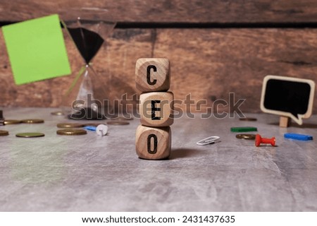 CEO word built with letter cubes.