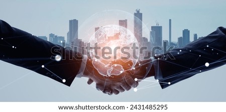Mixed media of group of people shaking hands and global communication network concept. Worldwide business. Marketing. Wide angle visual for banners or advertisements.