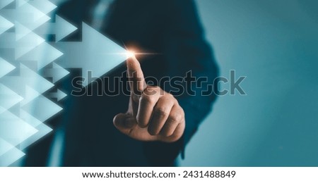 Businessman pointing arrow. Concept of business success, Influencer, Opinion leader and benchmark Royalty-Free Stock Photo #2431488849