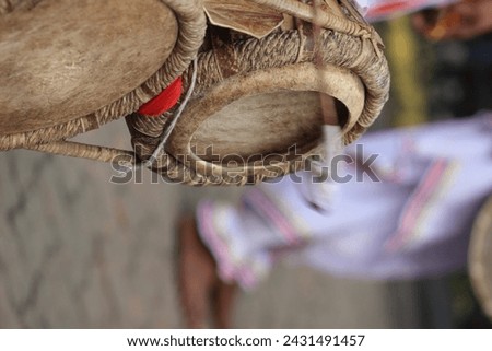 Sure, here's a descriptive caption for your photo:

"Captured in a moment of joy and cultural vibrancy, this enchanting image features a Philippine elephant gracefully swaying to the rhythm of traditi Royalty-Free Stock Photo #2431491457