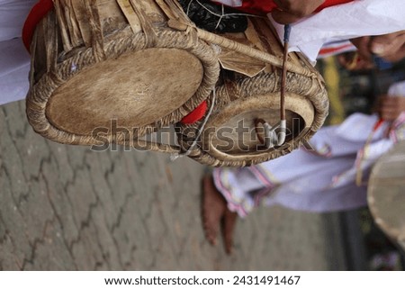 Sure, here's a descriptive caption for your photo:

"Captured in a moment of joy and cultural vibrancy, this enchanting image features a Philippine elephant gracefully swaying to the rhythm of traditi Royalty-Free Stock Photo #2431491467