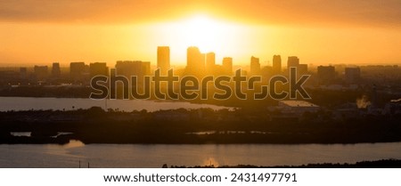 Urban sunset landscape of downtown district of Tampa city in Florida, USA. Dramatic skyline with high skyscraper buildings in modern american megapolis