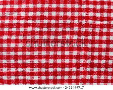 Red checkered background. Red texture