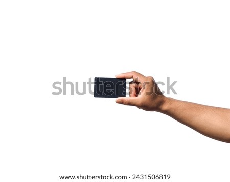 A man's hand makes a gesture of holding a black card.  or gray business card  Some types of documents, identity card or passport, isolated on white background.