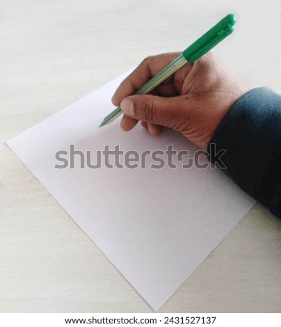 Writing involves a combination of fine motor skills, coordination, and sensory feedback. The thumb and fingers work together to hold a writing instrument like a pen or pencil. Royalty-Free Stock Photo #2431527137