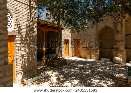 JUNE 28th, 2023, BUKHARA, UZBEKISTAN: Ancient minaret in the Old Town of Bukhara, Uzbekistan