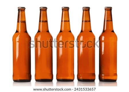 Bottles of beer over white background