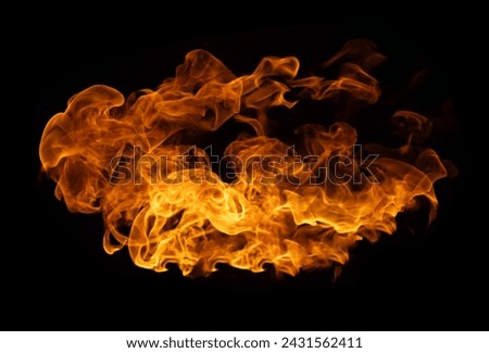 Fire and burning flame of explosive fireball isolated on dark background for abstract graphic design