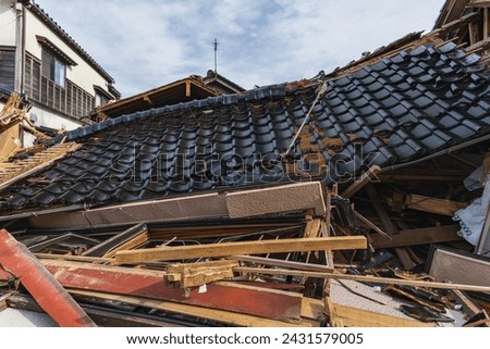 Noto Peninsula Earthquake: Collapsed houses Royalty-Free Stock Photo #2431579005