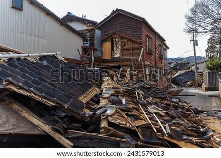 Noto Peninsula Earthquake: Collapsed houses Royalty-Free Stock Photo #2431579013