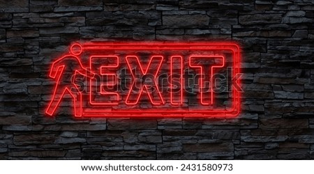 Exit neon sign on brick wall background.