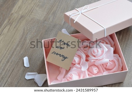 im sorry card between roses 