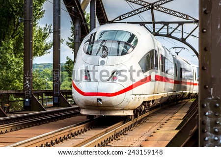 Electric InterCity Express in Frankfurt, Germany in a summer day Royalty-Free Stock Photo #243159148