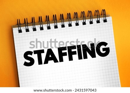 Staffing - process of finding the right worker with appropriate qualifications and recruiting them to fill a job position, text concept on notepad