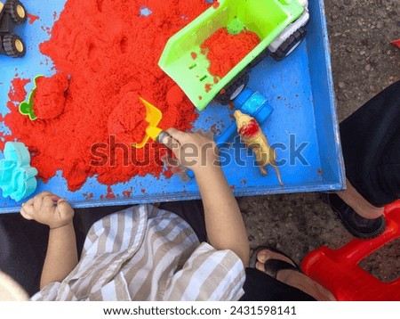 Toy sand and other children's play properties Royalty-Free Stock Photo #2431598141