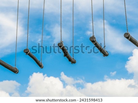 rope ladder against a blue sky and clouds Royalty-Free Stock Photo #2431598413