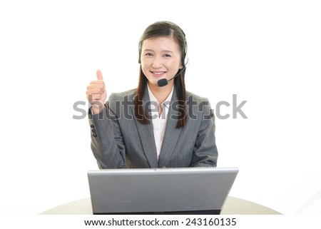 Call center operator showing thumbs up sign