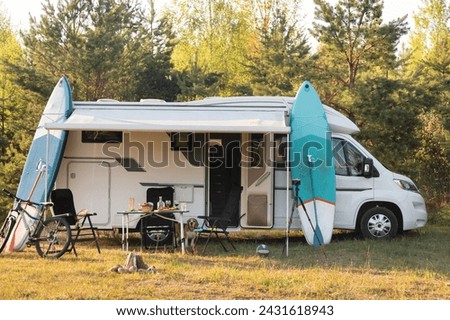 a vacation trip in a motorhome, a rest in a van. Royalty-Free Stock Photo #2431618943