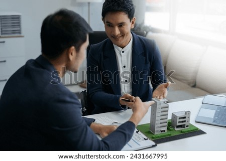 Real estate broker agent presenting and consult to customer to decision making.