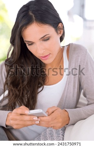 Woman, phone and reading with texting on sofa with scroll, search or update for web blog in home living room. Person, smartphone and typing with mobile app for connection with social media in house