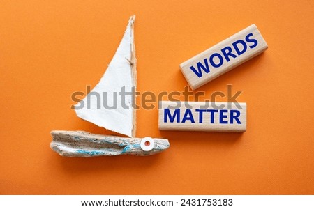 Words Matter symbol. Concept word Words Matter on wooden blocks. Beautiful orange background with boat. Business and Words Matter concept. Copy space