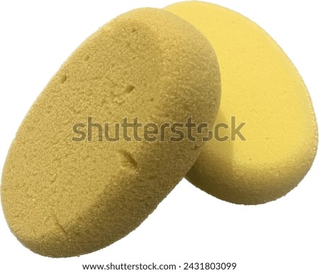 yellow sponges on a white background. close-up, close up of 2 sponges for bathing isolated on white background