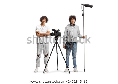 Boom and camera operators holding a microphone and smiling isolated on white background