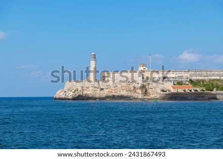 Lighthouse (Faro) at Castillo de los Tres Reyes del Morro at the mouth of Havana Harbor in Old Havana (La Habana Vieja), Cuba. Old Havana is a World Heritage Site. 