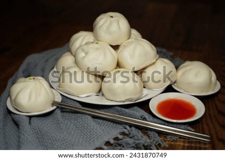 Bakpao is a traditional Chinese food which is a package.
In its meaning, bak means meat and Pao means package so bakpao means meat package
