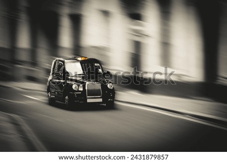 Iconic London Taxi. British Cab Royalty-Free Stock Photo #2431879857