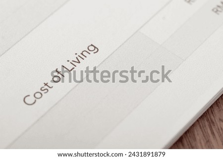 Cost of living refers to the amount of money that is required to maintain a certain standard of living in a particular geographic area Royalty-Free Stock Photo #2431891879