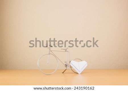 paper heart and bicycle , valentine day