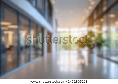 blurred for background. office building interior, empty hall in the modern office building. empty open space office. panoramic windows and beautiful lighting Royalty-Free Stock Photo #2431905229