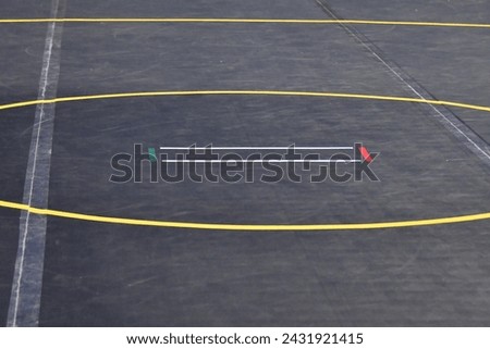 Circles and marks on a wrestling mat