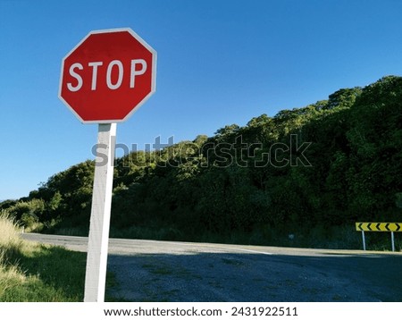 Stop sign at rural road crossing