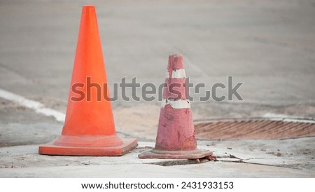 Traffic cone on the road with white line background, Safety concept