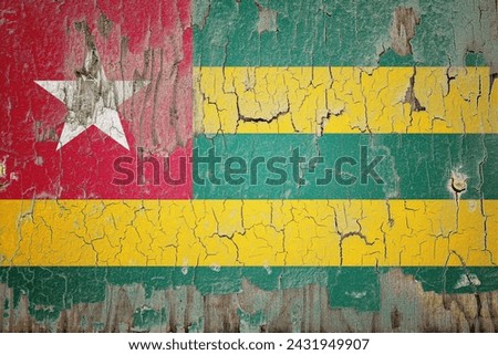 Togo flag and paint cracks. Prison concept with border image. Togo is currently heading toward recession. Inflation. employment. economic recession. Double exposure hologram
