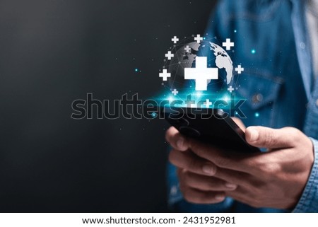 Medical technology concept.  Person use smartphone with globe with health care icon on virtual interface. Digital healthcare and medicine, internet network connection, Global health network.