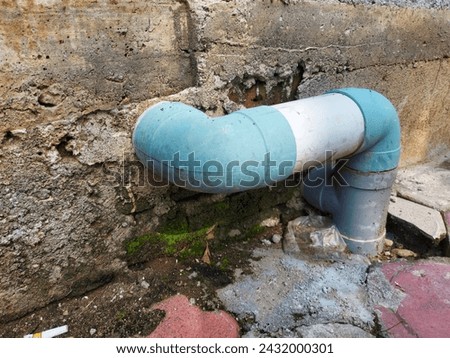 blue and white toilet pipes 2