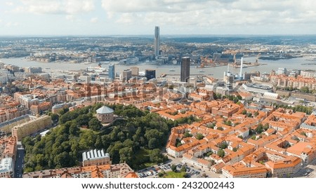 Gothenburg, Sweden. River Gota-Alv. Panoramic view of the central part of the city. Summer day. Cloudy weather, Aerial View   Royalty-Free Stock Photo #2432002443