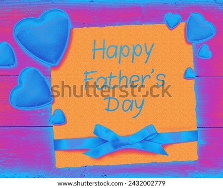 The image is a shape with the words "Happy Father's Day" written inside. It is a child's art piece, featuring hand-drawn text in a colorful painting or drawing.