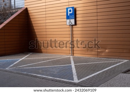 Disabled parking sign. Handicapped parking sign.
