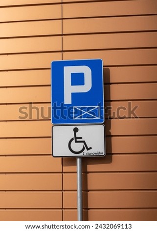 Disabled parking sign. Handicapped parking sign.
