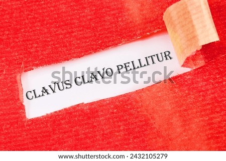 Clavus clavo pellitur. The ancient Greek expression translates as, A wedge is knocked out with a wedge. on a white background under torn paper