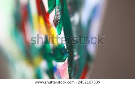 Close-up view of oil paint brush strokes. Macro shot of mixed colours on canvas. Fragment of painting. Modern artwork and creative masterpiece. Art and hobby concept