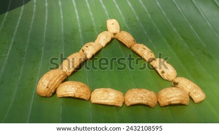 this is a picture of snacks on a leaf